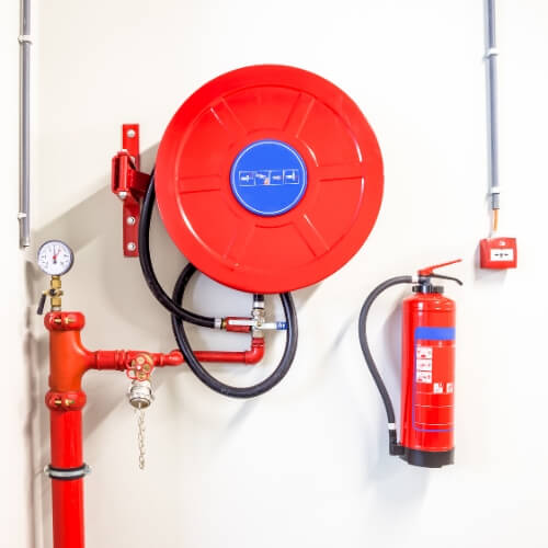 Water mist fire suppression system for commercial and residential buildings